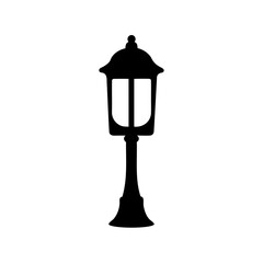Elegant black silhouette of a vintage outdoor street lamp or lamppost