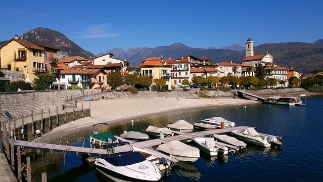Idyllic rustic village of Feriolo on the shores of Lake Maggiore in Italy, captured on a beautiful autumn day.