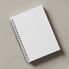 blank notebook on white background. White spiral-bound notebook mockup on a white background. flat lay, diffused lighting.