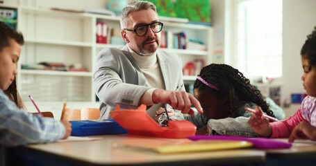 Conversation, man and students in classroom, education and help with child development. Group, teacher and kids in school, learning and knowledge with growth, drawing and discussion with creativity - Powered by Adobe