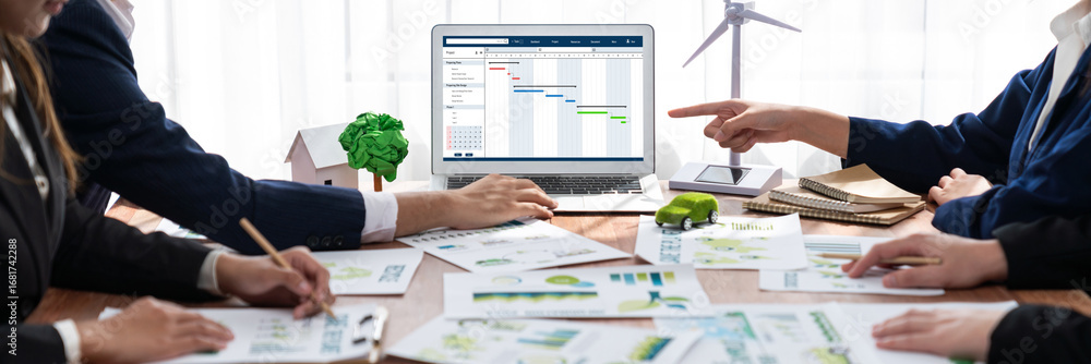 Aufkleber project planning software for brisk business project management on the computer screen showing timel