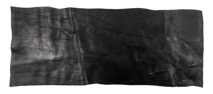 A piece of leather on a white background. Black skin isolate