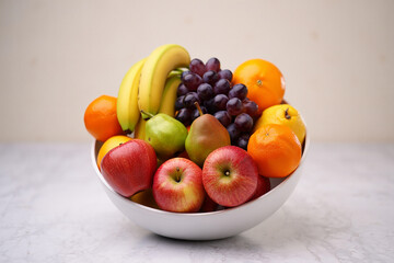 A vibrant and abundant assortment of fresh ripe fruits including apples bananas grapes pears and oranges artfully arranged in a white bowl