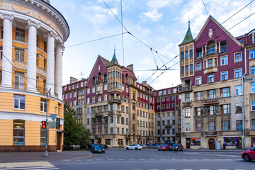 Obraz premium Eclectic architectural complex combining modern, gothic and russian revival styles with arches and courtyards. Polezhaev House, Saint Petersburg, Russia.