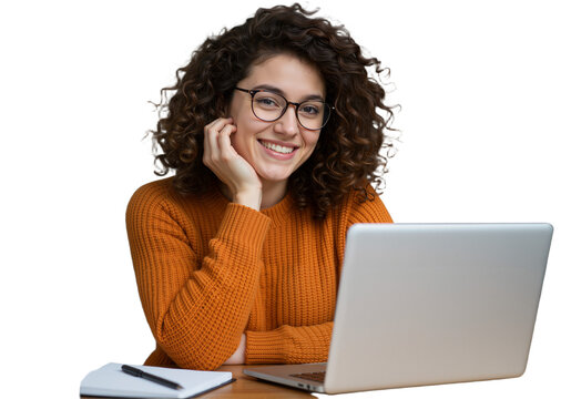 Positive young woman with glasses, smiling and focused while studying or working on her laptop in a comfortable home environment
