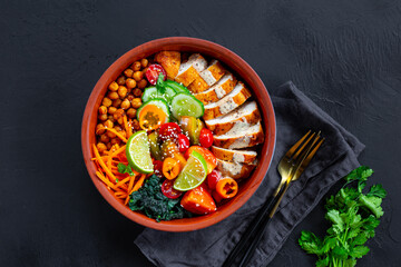 Buddha Bowl with Chickpeas, chicken breast and Fresh Vegetables, Healthy Eating, black background
