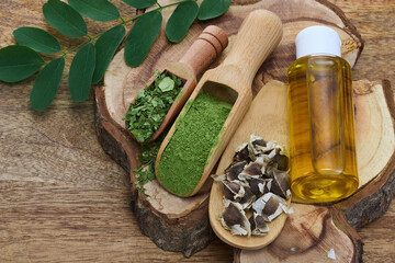 Moringa Herbal Ingredients on wooden background