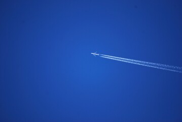 Airplane in the blue sky