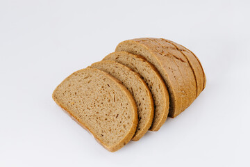 Sliced rye bread loaf isolated on white background, healthy whole grain bakery product