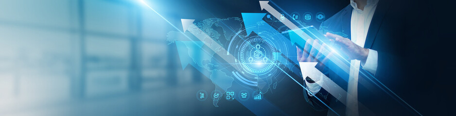 Supply chain manager using tablet analyzing distribution networks and delivery growth. Inventory...