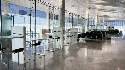 Silent modern airport terminal, echoing solitude, vast expanse, embracing aviation dreams,...