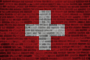 Old brick wall Switzerland flag background. 3d illustration.