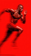 Athletic man sprinting with dynamic motion against a vibrant red background during a high-energy training session