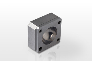 A detailed metal component is displayed prominently on a clean, white surface.