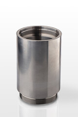 A polished stainless steel cylinder showcases its smooth surface and threaded base. This versatile component is ideal for various industrial operations, ensuring durability and reliability.