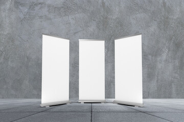 Empty three rollup banners stand. Blank template mockups. Exhibition stand 3 roll-up banners, screen for you design. Vertical white roll up for preview.