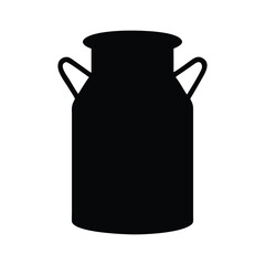 An empty antique glass milk bottle isolated on a white background