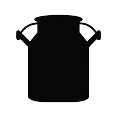 An isolated vintage metal milk bottle and jug set on a white background