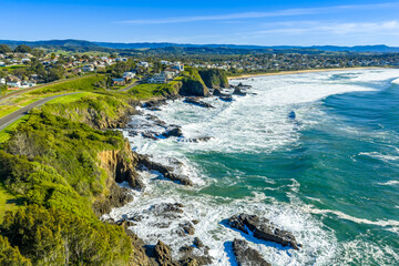 Drone aerial photograph of the rugged coastline in the Kiama suburb of Kiama Downs on the South Pacific Ocean coast in the Illawarra region on the south coast of New South Wales, Australia. 