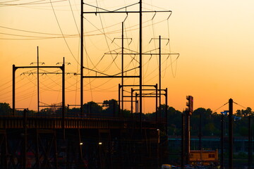 Power lines at sunrise in Philadelphia during the summer of 2025 along the High Line near 30th street station