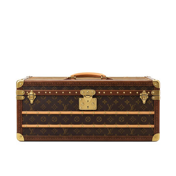 high-end louis vuitton luggage trunk with iconic monogram pattern and hardware
