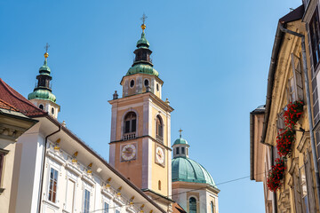 Fototapeta premium Clock tower of Ljubljana Cathedral in the capital of Slovenia.