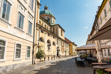 Street in the historic center where St. Nicholas Cathedral is located in Ljubljana, Slovenia.