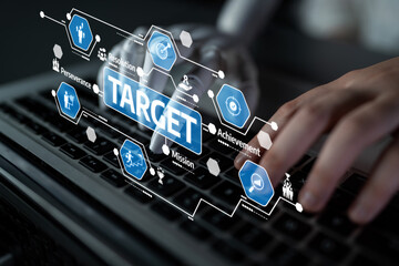 A futuristic scene featuring a robotic hand interacting with a laptop keyboard while displaying a data visualization screen focused on target metrics and performance indicators. Tessel