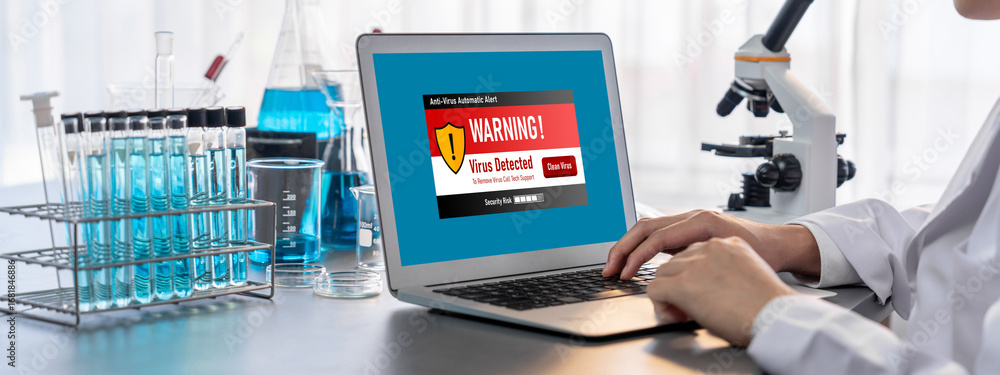 Poster virus warning alert on computer screen detected brisk cyber threat , hacker, computer virus and malw