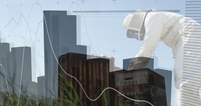 Leaning beekeeper in suit inspecting hives on grass, with skyline and graph overlays, copy space - Powered by Adobe