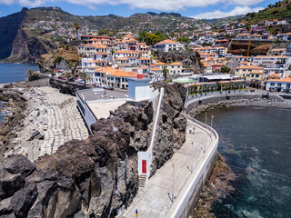 Lighthouse in port of Camara de Lobos on Madeira Island, Portugal