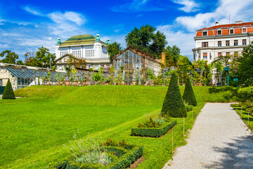 Fototapeta premium Botanical Garden in Zagreb, Croatia, Historical archive building (old national library) in the background.
