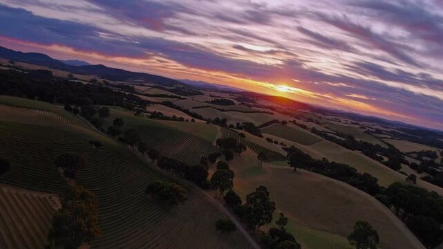 aerial perspective captured by unmanned aircraft of regional town during the evening when the sun is below the horizon