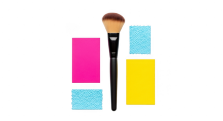 A makeup brush is placed on a white surface with colorful squares and textured rectangles isolated on transparent background