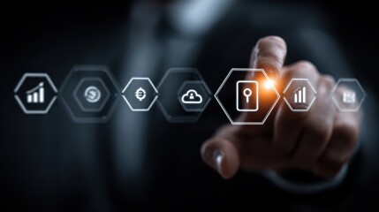 Mans finger selects a glowing security icon from a series of hexagonal business and financial icons on an interactive display screen