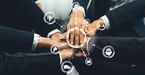 A professional group of hands united in collaboration, showcasing teamwork with digital icons...