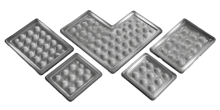 Stacked food trays with embossed circles