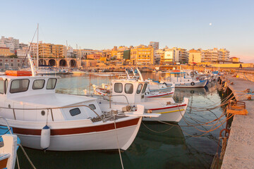 View of Heraklion Venetian Harbor with boats in Heraklion Greece