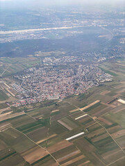 View from above showing the town of Mainz-Finthen surrounded by vineyards and agricultural and viticultural fields in the Rhein-Main region, Germany