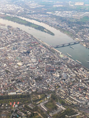 Aerial view of central Mainz, Germany with River Rhine, historic buildings, bridges, and the city's cathedral visible from above