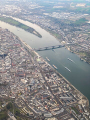 Aerial view of central Mainz, Germany with River Rhine, historic buildings, bridges, and the city's cathedral visible from above