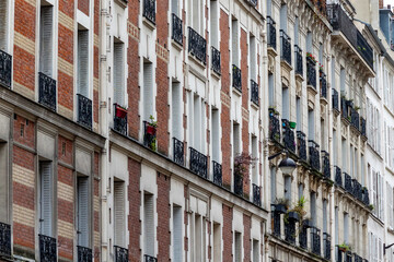 Paris apartment building with wrought iron balconies
