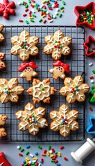 Fototapeta premium A festive scene of freshly baked Christmas cookies, cooling on a wire rack, surrounded by sprinkles and cookie cutters, baking, festive colors