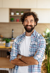 Confident man in casual wear at home