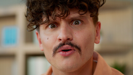 Close up face male funny happy man businessman wonder surprised guy wow expression shock amazing...