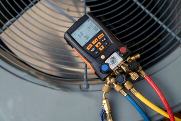 Digital HVAC Manifold Gauge on Air Conditioning Unit