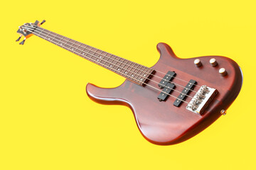 Obraz premium Modern electric guitar on yellow background