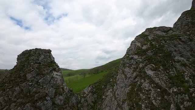 Dragons Back, Peak District, England, FPV drone footage, landscape orientation, showcases the beautiful English countryside.