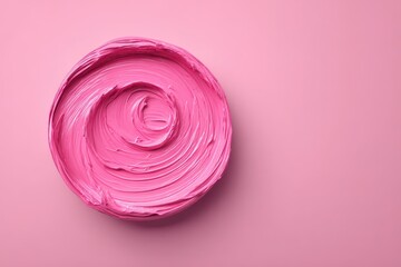 A beautifully swirled sample of pastel pink paint on a complementary background, showcasing smooth textures and a modern, minimalist aesthetic appealing design.