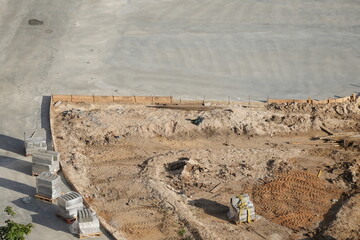 Construction site with building materials and soil, top view  
